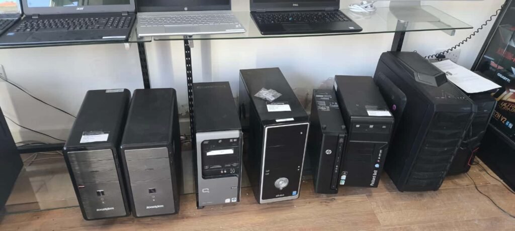 Professional computer repair technician diagnosing computer issues